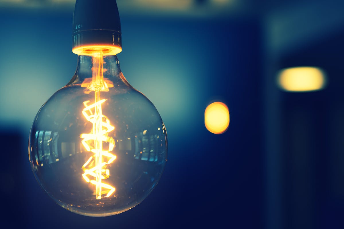 hanging lightbulb with lit-up filament